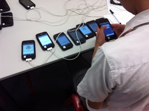 student coordinating iphones for the game