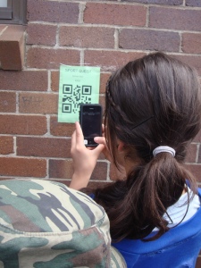 student scanning QR code