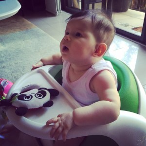 My baby at 7 months old. I returned to full time work when she was 6 months old.